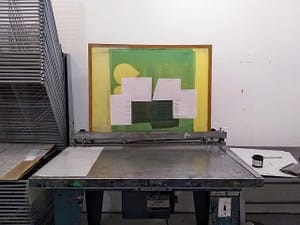 An image of my silkscreen mounted on the vacuum table, ready for printing.