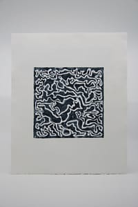 A black, watercolour-like square print with thin, white squiggly lines creating this maze-like shape.